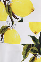 Laden Sie das Bild in den Galerie-Viewer, Blaues Vintage Kleid mit Blumendruck und quadratischem Ausschnitt aus den 1950er Jahren