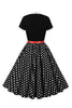 Laden Sie das Bild in den Galerie-Viewer, A Linie Schwarzes Polka Dots Kurzarm Kleid aus den 1950er Jahren mit Gürtel