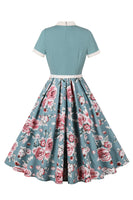 Laden Sie das Bild in den Galerie-Viewer, Blaue Kleider mit Blumendruck aus den 1950er Jahren mit kurzen Ärmeln