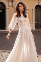 Laden Sie das Bild in den Galerie-Viewer, Elfenbein Brautkleid mit langen Ärmeln und Applikationen