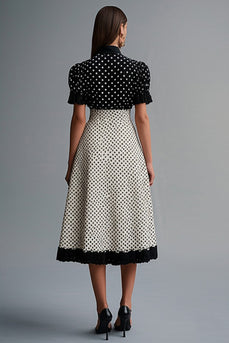 Vintage Schwarz-weißes Polka Dots Kleid mit Rüschen und Reversausschnitt