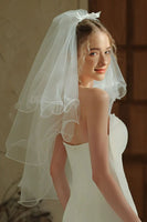 Laden Sie das Bild in den Galerie-Viewer, Tüll-Elfenbein Kurzbrautschleier mit Schleife