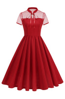 Laden Sie das Bild in den Galerie-Viewer, Schwarzes Halsausschnitt A-Linien Kleid der 1950er Jahre mit Punkten