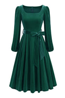 Laden Sie das Bild in den Galerie-Viewer, Dunkelgrünes Langarm A-Linie Kleid 1950er Jahre mit Gürtel