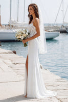Laden Sie das Bild in den Galerie-Viewer, Ivory Spaghetti Straps Mermaid Appliqued Long Wedding Dress with Slit