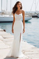Laden Sie das Bild in den Galerie-Viewer, Ivory Spaghetti Straps Mermaid Appliqued Long Wedding Dress with Slit