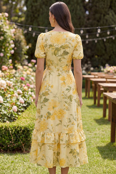 Gelbe Rüschenbutter-Puffärmel Ein geblümtes Midikleid mit Schleife