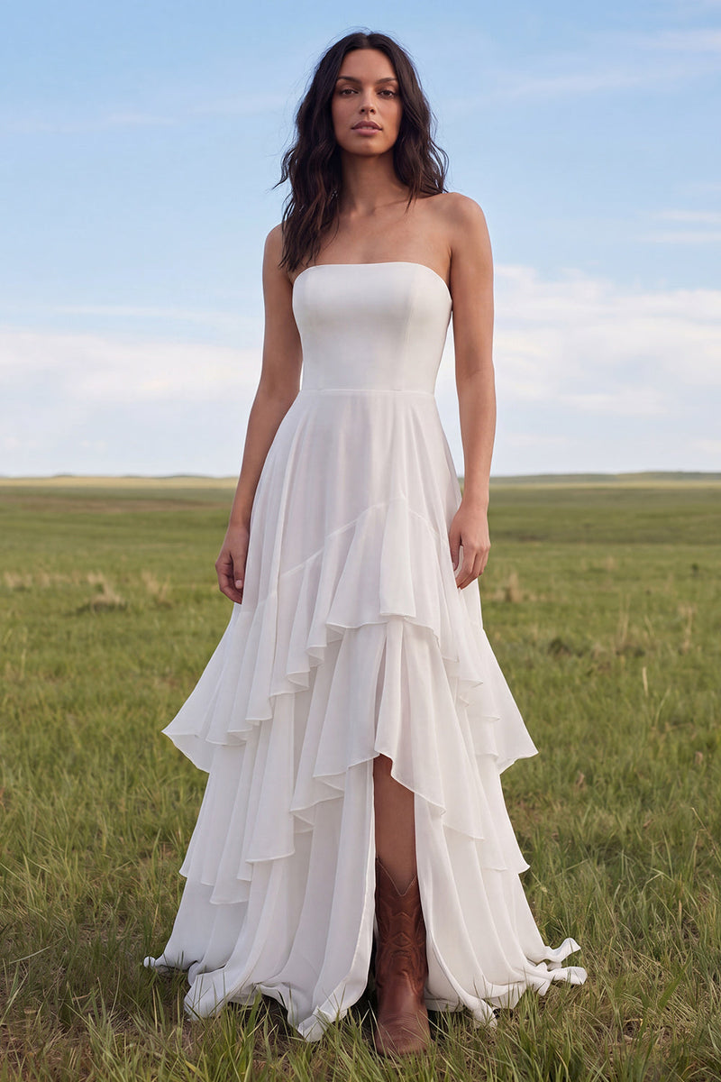 Laden Sie das Bild in den Galerie-Viewer, Trägerloses Elfenbein-A-Linie-Rüschen-Boho-Hochzeitskleid mit Schlitz