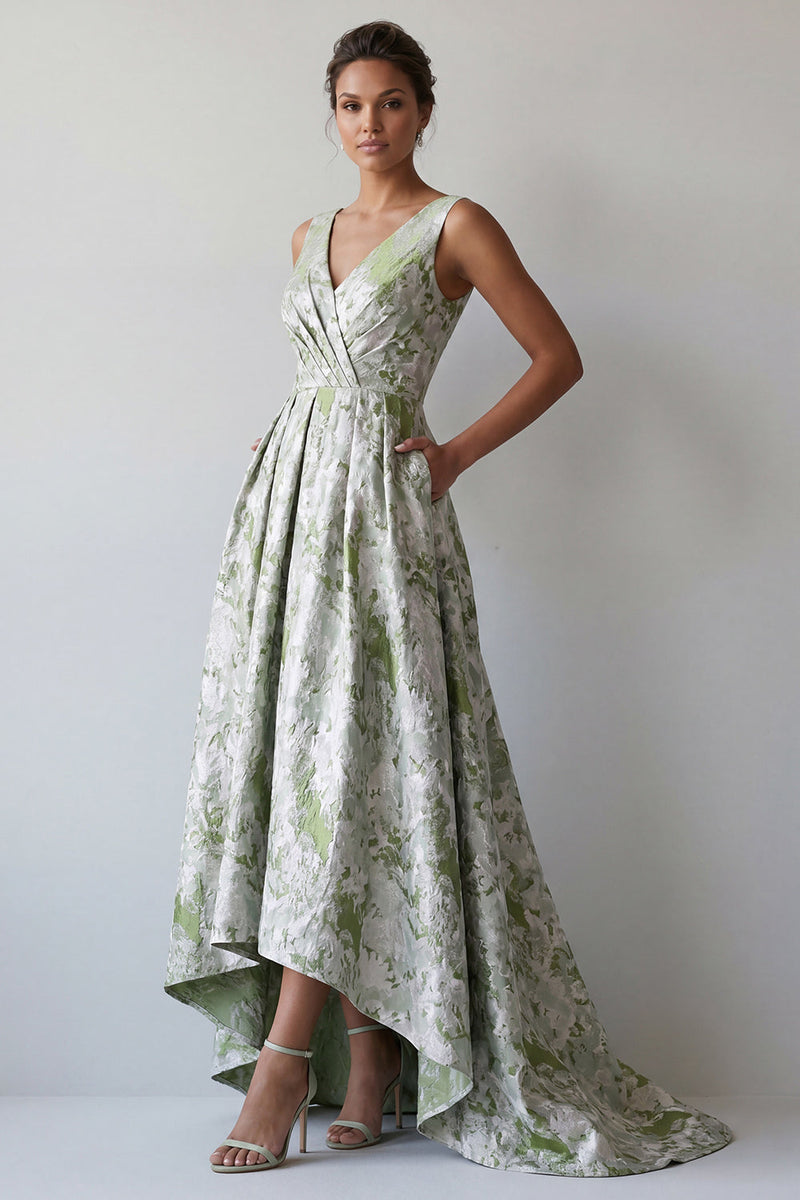 Laden Sie das Bild in den Galerie-Viewer, Ein hellgrünes, gezocktes Mutter-der-Braut-Kleid mit einer hellgrünen Blume und Taschen