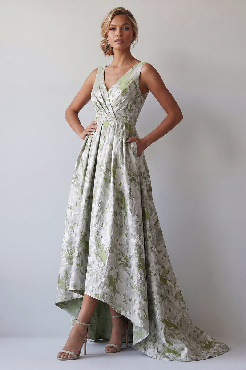 Laden Sie das Bild in den Galerie-Viewer, Ein hellgrünes, gezocktes Mutter-der-Braut-Kleid mit einer hellgrünen Blume und Taschen