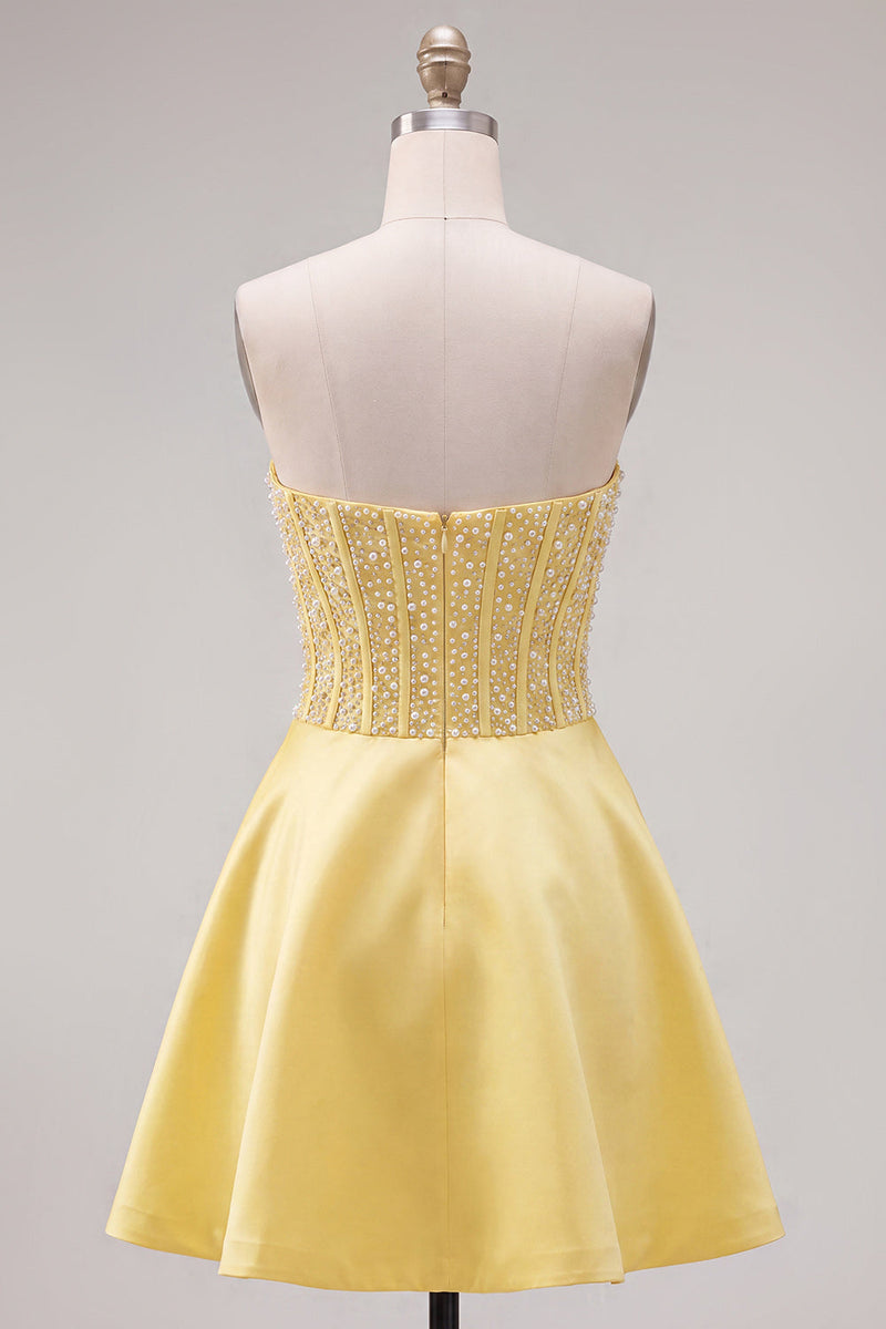 Laden Sie das Bild in den Galerie-Viewer, Gelbes Sweetheart A-Line Pearls Korsett-Heimkehrkleid mit Schleife