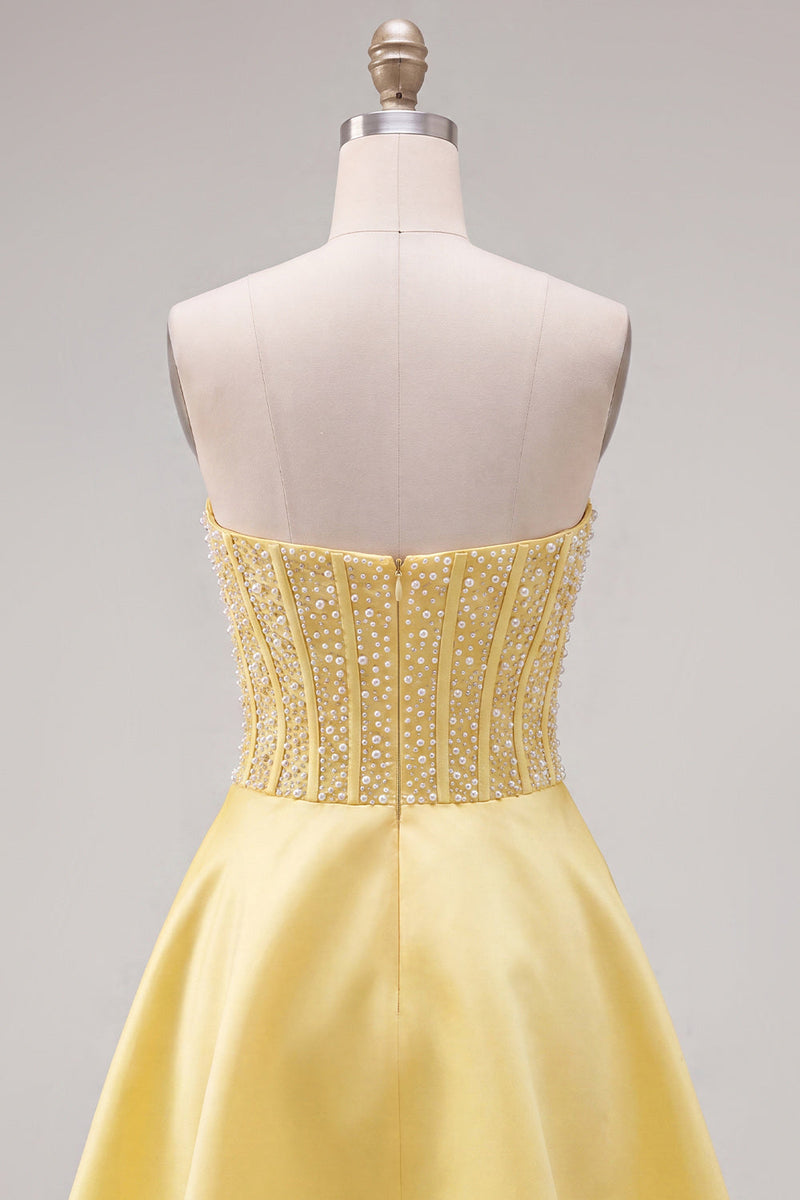 Laden Sie das Bild in den Galerie-Viewer, Gelbes Sweetheart A-Line Pearls Korsett-Heimkehrkleid mit Schleife