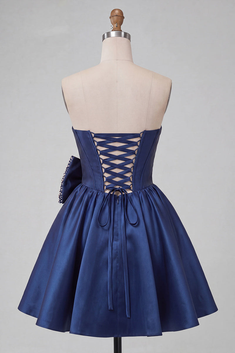 Laden Sie das Bild in den Galerie-Viewer, Marineblaues, satinblaues, trägerloses A-Linien-Perlenkorsett mit Schluss Rücken-Heimkehrkleid mit Schleife