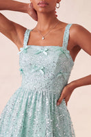 Laden Sie das Bild in den Galerie-Viewer, Himmelblaues A-Linie-Eck mit quadratischem Halsausschnitt und Pailletten-Pailletten-Homecoming-Kleid mit Schleife