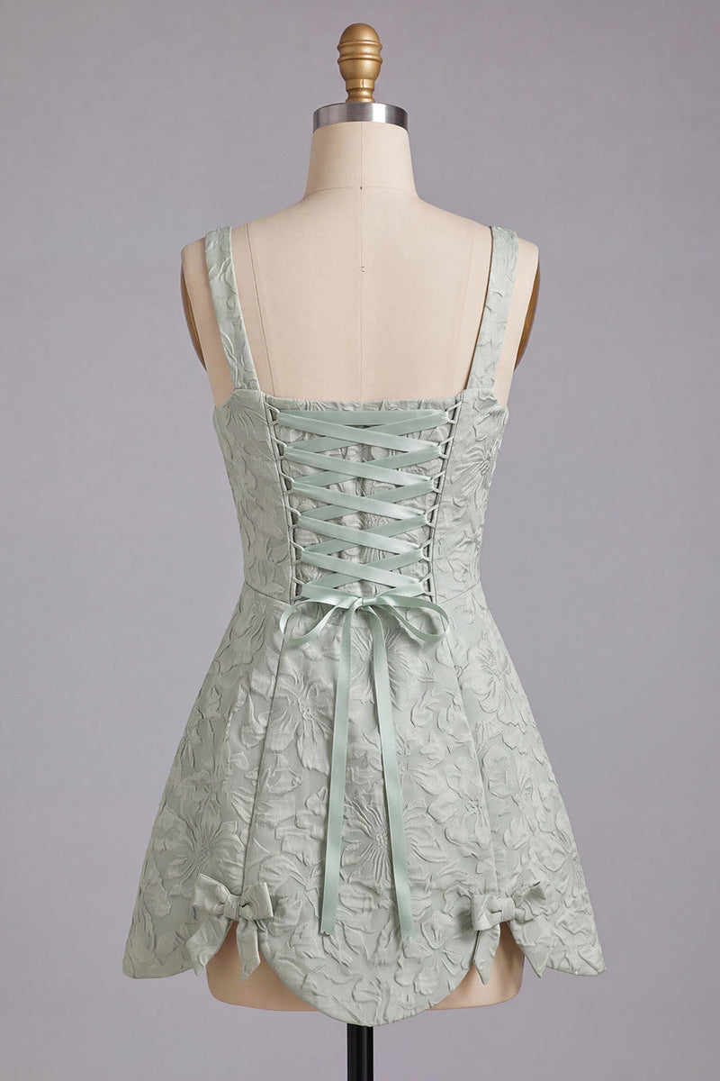 Laden Sie das Bild in den Galerie-Viewer, A-Linie staubiges Salbei-Quadrathals-Jacquard-Floral-Spitzenkleid mit Heimkehrkleid mit Schleife