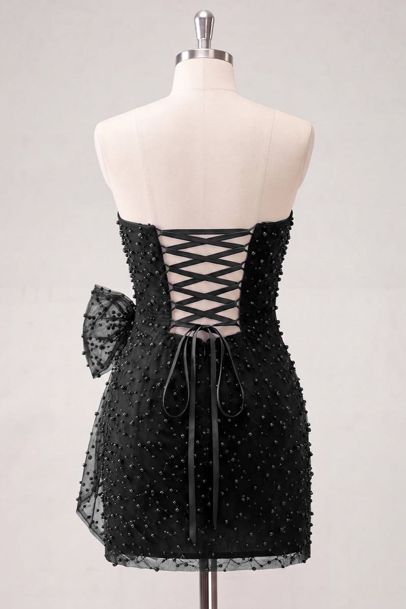 Laden Sie das Bild in den Galerie-Viewer, Marineblaues, trägerloses, mit Perlen besetztes, enges Spitzen-Hinten-Kurzes Homecoming-Kleid mit Schleife
