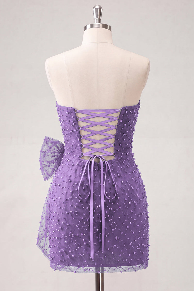 Laden Sie das Bild in den Galerie-Viewer, Marineblaues, trägerloses, mit Perlen besetztes, enges Spitzen-Hinten-Kurzes Homecoming-Kleid mit Schleife