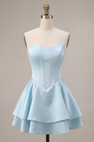 Laden Sie das Bild in den Galerie-Viewer, Trägerloses blaues baskisches Taillen-A-Linie gestuftes, gerüschendes Korsett-Satin-Homecoming-Kleid