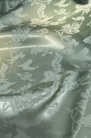 Laden Sie das Bild in den Galerie-Viewer, Trägerloses Salbei-Blumenkorsett Meerjungfrauen-Zug-langes Brautjungfernkleid mit Schlitz