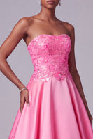 Laden Sie das Bild in den Galerie-Viewer, Leuchtend Rosa Trägerloses Satin Blumensticker Pailletten A-Linie Langes Ballkleid
