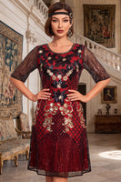 Laden Sie das Bild in den Galerie-Viewer, Schwarze goldene Rundhals Stickerei Pailletten Midi 20er Jahre Flapper Kleid mit Halbärmeln