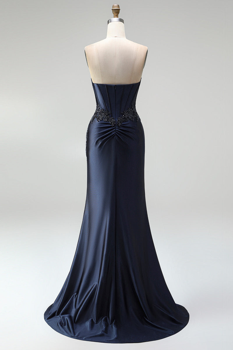 Laden Sie das Bild in den Galerie-Viewer, Dunkelblaues Meerjungfrauen Korsett Perlenapplikationen Satin Trägerloses Langes Abschlussballkleid mit Schlitz
