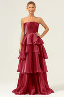 Laden Sie das Bild in den Galerie-Viewer, Dunkelblaues Langes A-Linie Trägerloses Gestuftes Satin Ballkleid