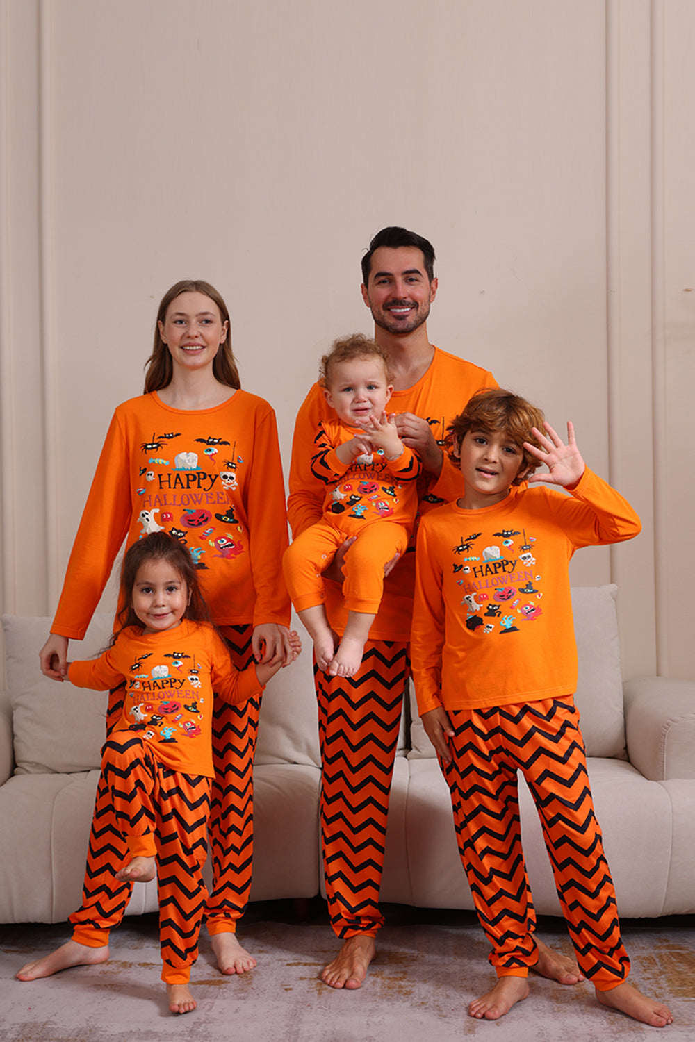 Orange gestreifter Halloween-Familienpyjama