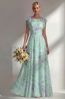 Laden Sie das Bild in den Galerie-Viewer, Ein langes Brautjungfernkleid mit blauem Chiffonmuster und Rüschen