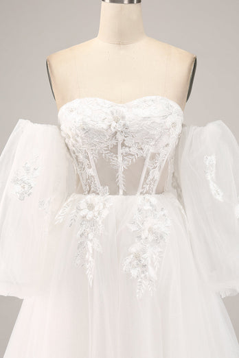 Schulterfreies Brautkleid aus Tüll mit Applikationen