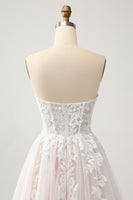 Laden Sie das Bild in den Galerie-Viewer, Weißes A-Linie Herzausschnitt Brautkleid mit Applikation und Spitze