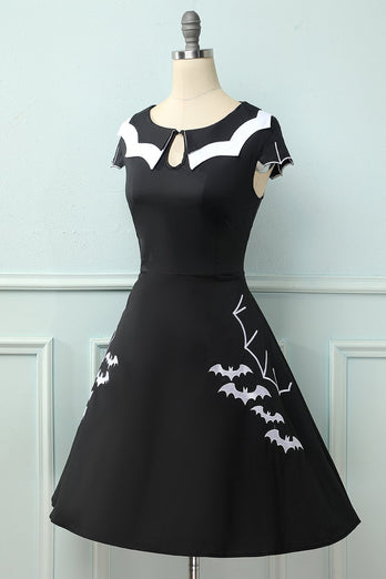 Schwarzes 1950er Fledermaus Cape Swing Kleid