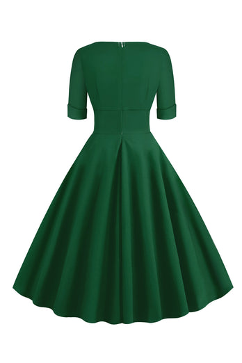 Grüner V-Ausschnitt Kurzarm 1950er Jahre Swing Kleid
