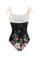 Laden Sie das Bild in den Galerie-Viewer, Vintage bedrucktes schwarzes einteiliges Bademoden-Set mit Strandrock