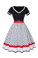 Laden Sie das Bild in den Galerie-Viewer, Schwarzes Polka Dots Rockabilly Kleid mit V-Ausschnitt aus den 1950er Jahren