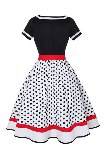 Schwarzes Polka Dots Rockabilly Kleid mit V-Ausschnitt aus den 1950er Jahren