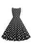 Laden Sie das Bild in den Galerie-Viewer, Schwarzes Polka Dots Rockabilly Kleid aus den 1950er Jahren