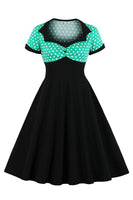 Laden Sie das Bild in den Galerie-Viewer, Schwarzes Polka Dots Rockabilly 1950er Jahre Kleid mit kurzen Ärmeln