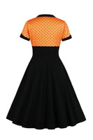 Laden Sie das Bild in den Galerie-Viewer, Schwarzes Polka Dots Rockabilly 1950er Jahre Kleid mit kurzen Ärmeln