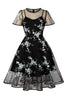 Laden Sie das Bild in den Galerie-Viewer, Swing Schwarzes Kleid aus den 1950er Jahren mit Stickerei