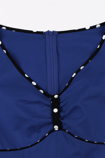 Dunkelblaues Polka Dots Rockabilly Kleid mit V-Ausschnitt