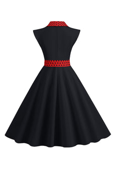 Schwarzes Polka Dots Rockabilly Kleid mit Schleife