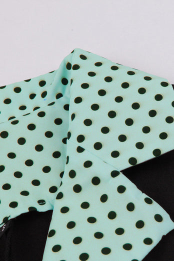 Grünes kurzärmeliges Polka Dots 1950er Jahre Kleid mit Gürtel