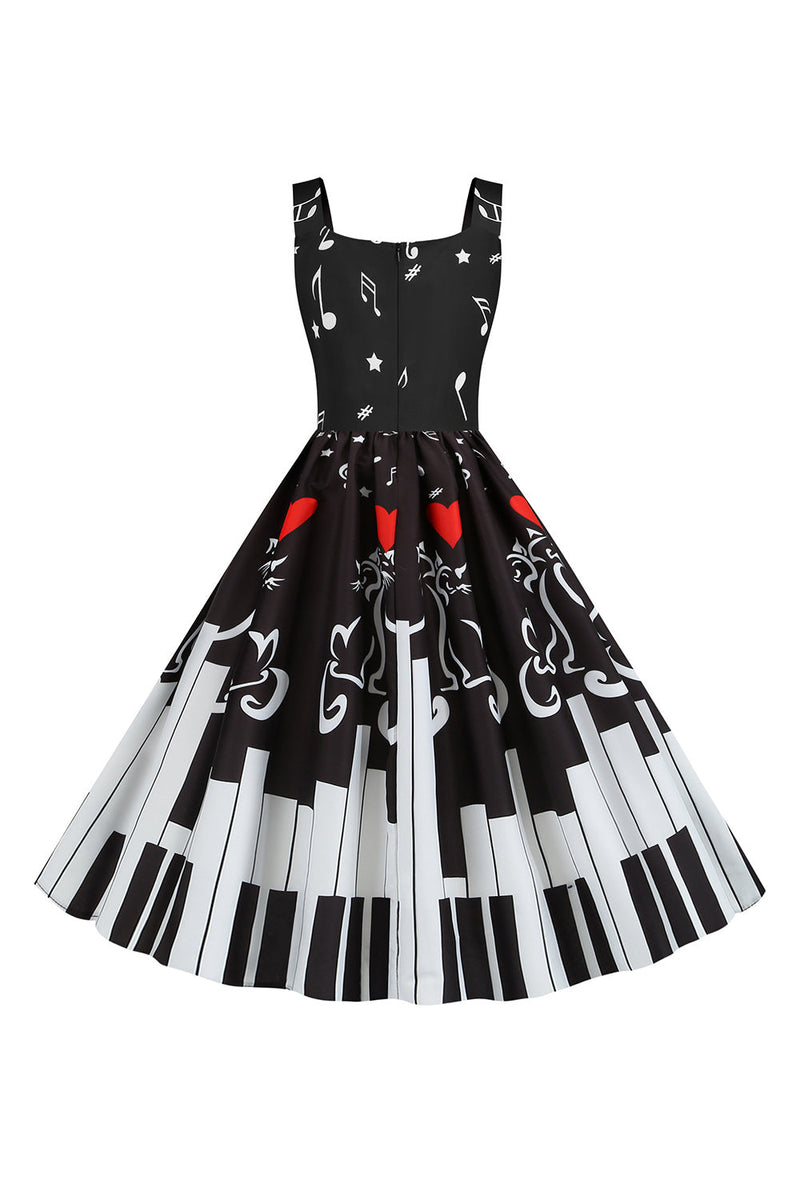 Laden Sie das Bild in den Galerie-Viewer, Schwarzes ärmelloses bedrucktes Kleid aus den 1950er Jahren
