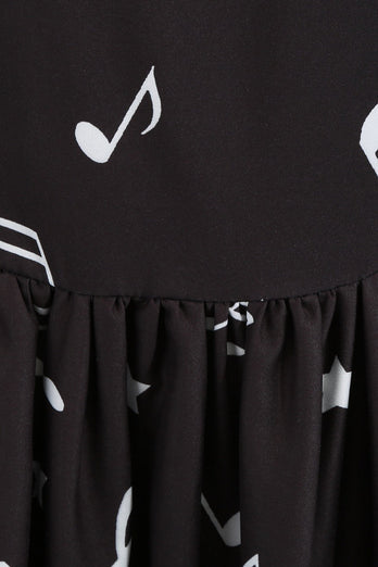 Schwarzes ärmelloses bedrucktes Kleid aus den 1950er Jahren