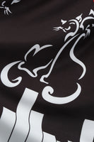 Laden Sie das Bild in den Galerie-Viewer, Schwarzes ärmelloses bedrucktes Kleid aus den 1950er Jahren