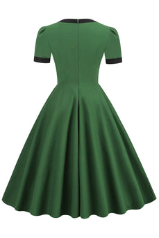 Dunkelgrünes Swing 1950er Jahre Kleid mit Schleife