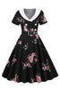 Laden Sie das Bild in den Galerie-Viewer, Schwarzes Vintage Kleid mit Blumen bedruckung und Gürtel