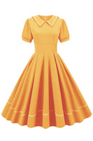 Laden Sie das Bild in den Galerie-Viewer, Blaues Kleid im Retro Stil der 1950er Jahre mit kurzen Ärmeln