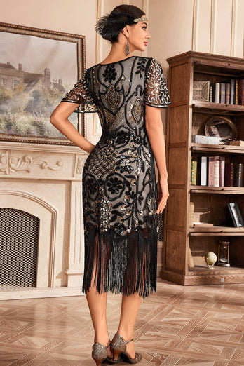 Schwarzes goldenes Gatsby Kleid mit V-Ausschnitt und Fransen aus den 1920er Jahren mit Pailletten